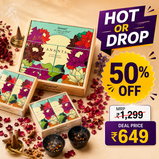 Three wooden boxes of Pyyasa Ananta herbal incense sticks arranged on a beige surface with scattered dried flower petals and two lit incense burners. Large promotional text overlays read 'HOT OR DROP', '50% OFF', and the deal price.