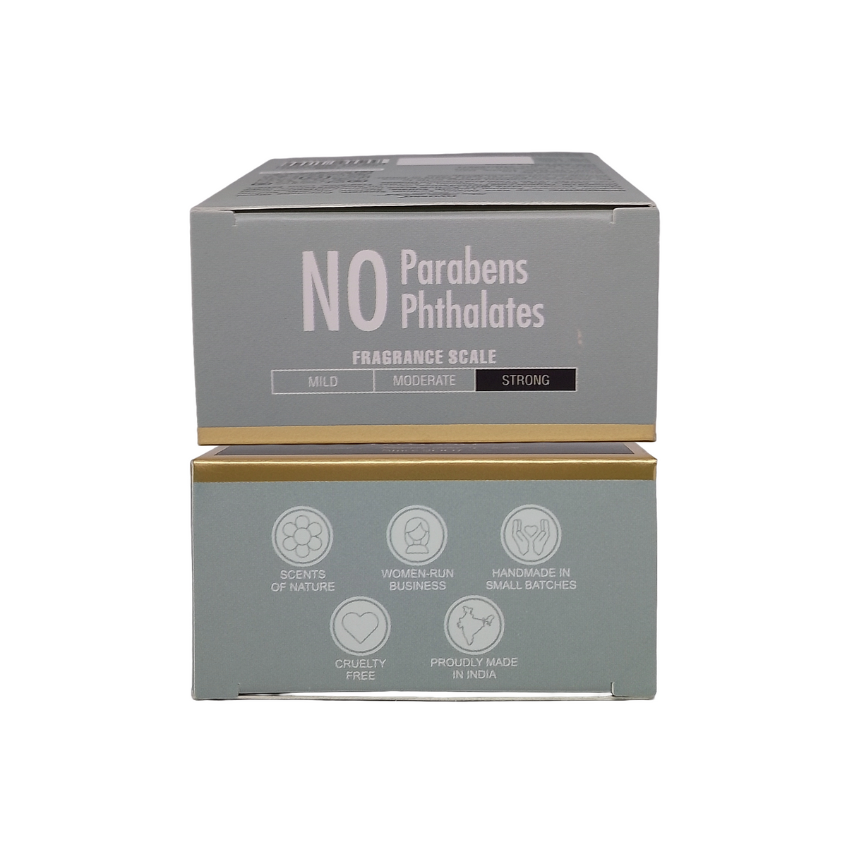 Two stacked rectangular product boxes on a plain white background. The top box is light gray with large white text reading 'NO Parabens Phthalates' and smaller text 'FRAGRANCE SCALE' with 'MILD', 'MODERATE', and 'STRONG' labels.