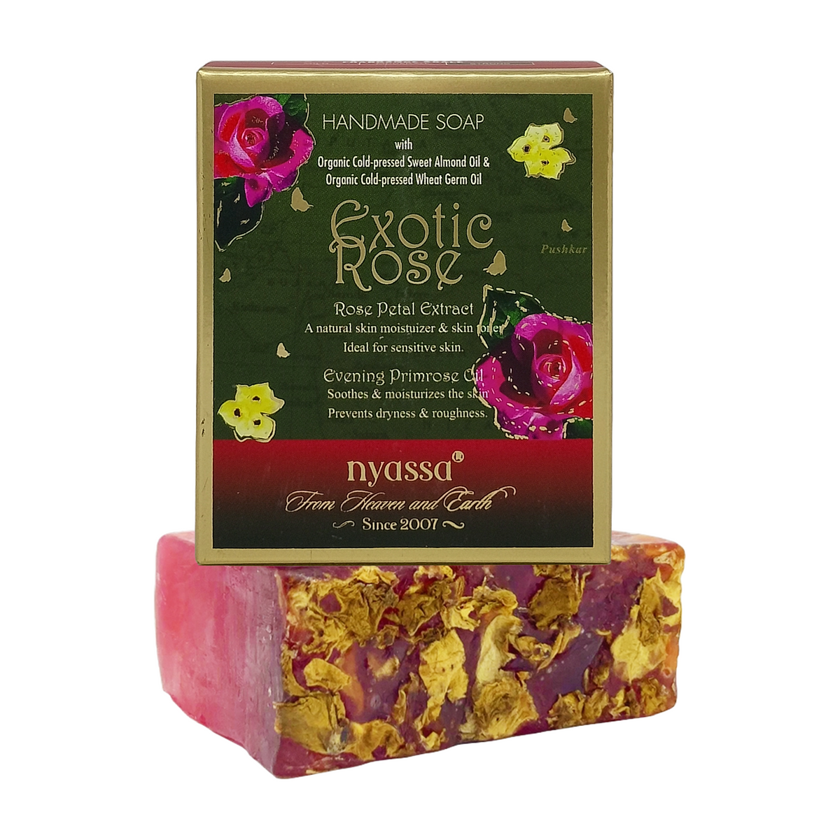 Nyassa Exotic Rose Handmade Soap with its decorative packaging box, displayed on a clean white background. The soap bar features pink and gold dried flower inclusions, and the box is dark green with rose illustrations.