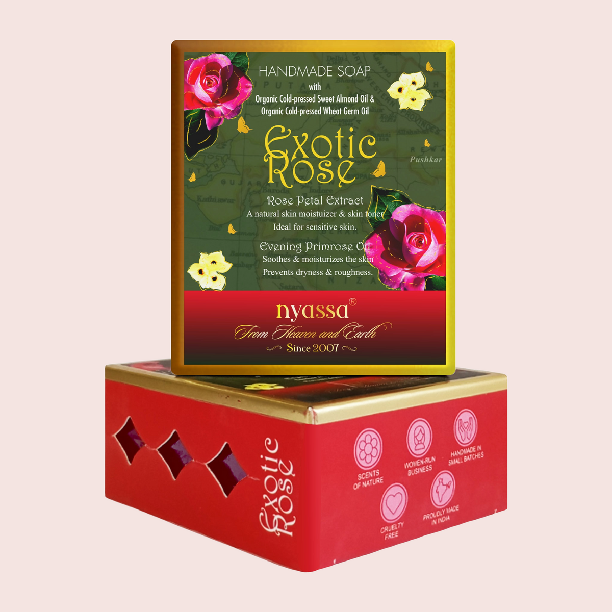 A boxed handmade soap product displayed on top of its red and gold retail box. The front label reads 'Exotic Rose' and 'Nyassa From Flowers and Earth Since 2013,' with pink rose illustrations and green background artwork.