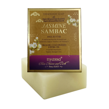 Nyssa Jasmine Sambac handmade soap bar with its gold and purple packaging box, displayed on a clean white background.