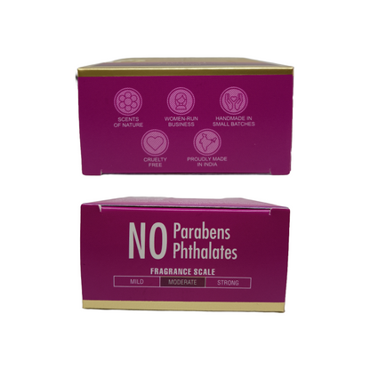 Two magenta-colored product boxes stacked vertically on a white background. The top box shows six circular icons with text about being a women-run business, scents of nature, handmade in small batches, cruelty free, and proudly made in India.
