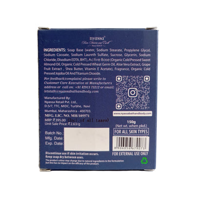 The back of a square Tysвенso soap box, showing product details, ingredients, a QR code, and a barcode on a plain white background.