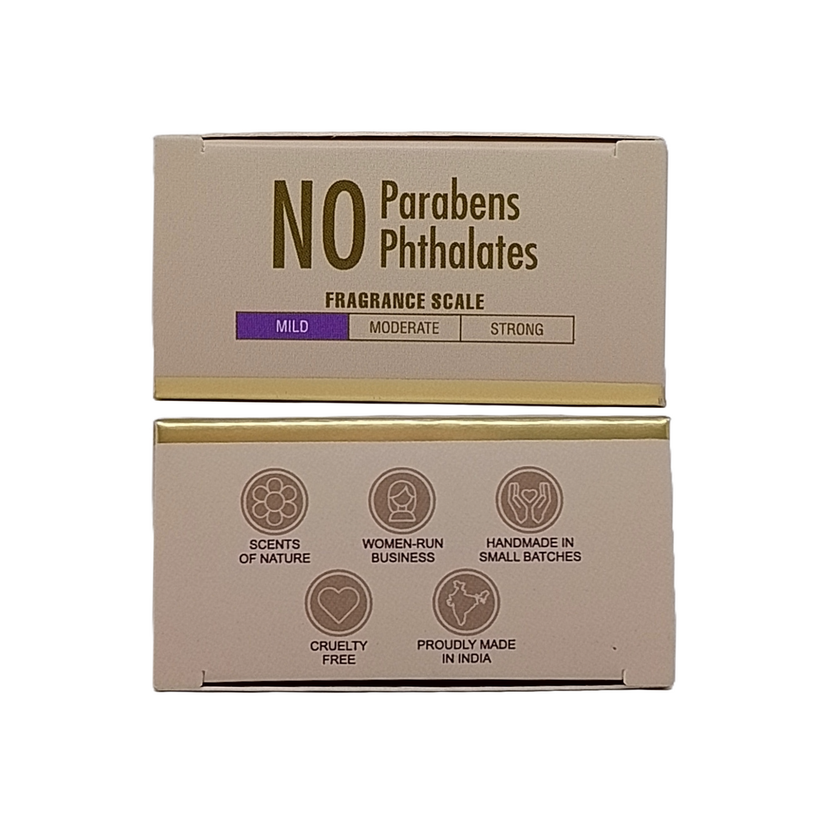 Two rectangular product boxes stacked vertically on a plain white background. The boxes are beige with gold-toned borders and printed text reading 'NO Parabens Phthalates' and 'Fragrance Scale' with mild, moderate, and strong options.