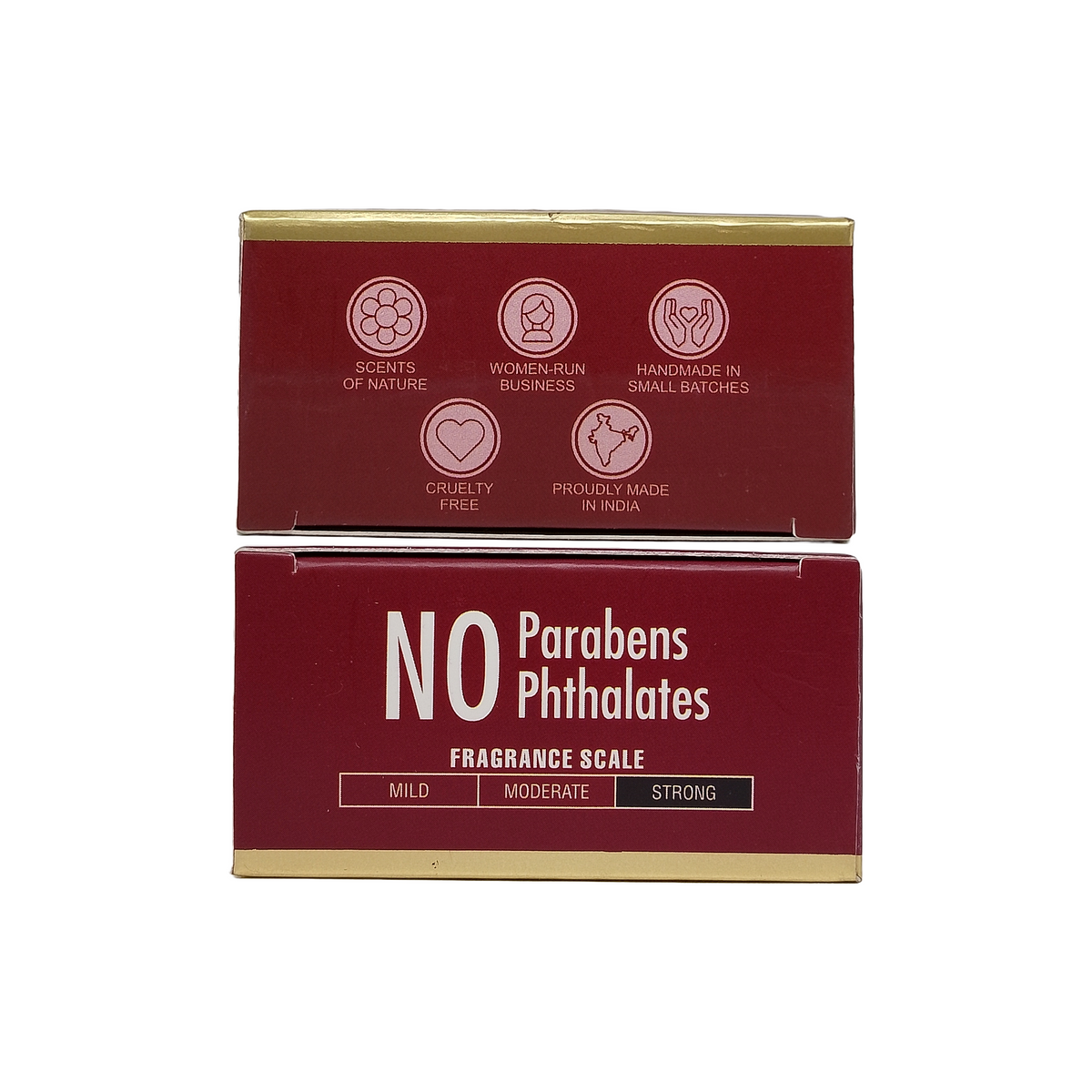 Two rectangular fragrance product boxes stacked vertically on a plain white background. The boxes are dark red with gold trim and printed text including 'NO Parabens Phthalates' and 'Fragrance Scale' with mild, moderate, and strong options.