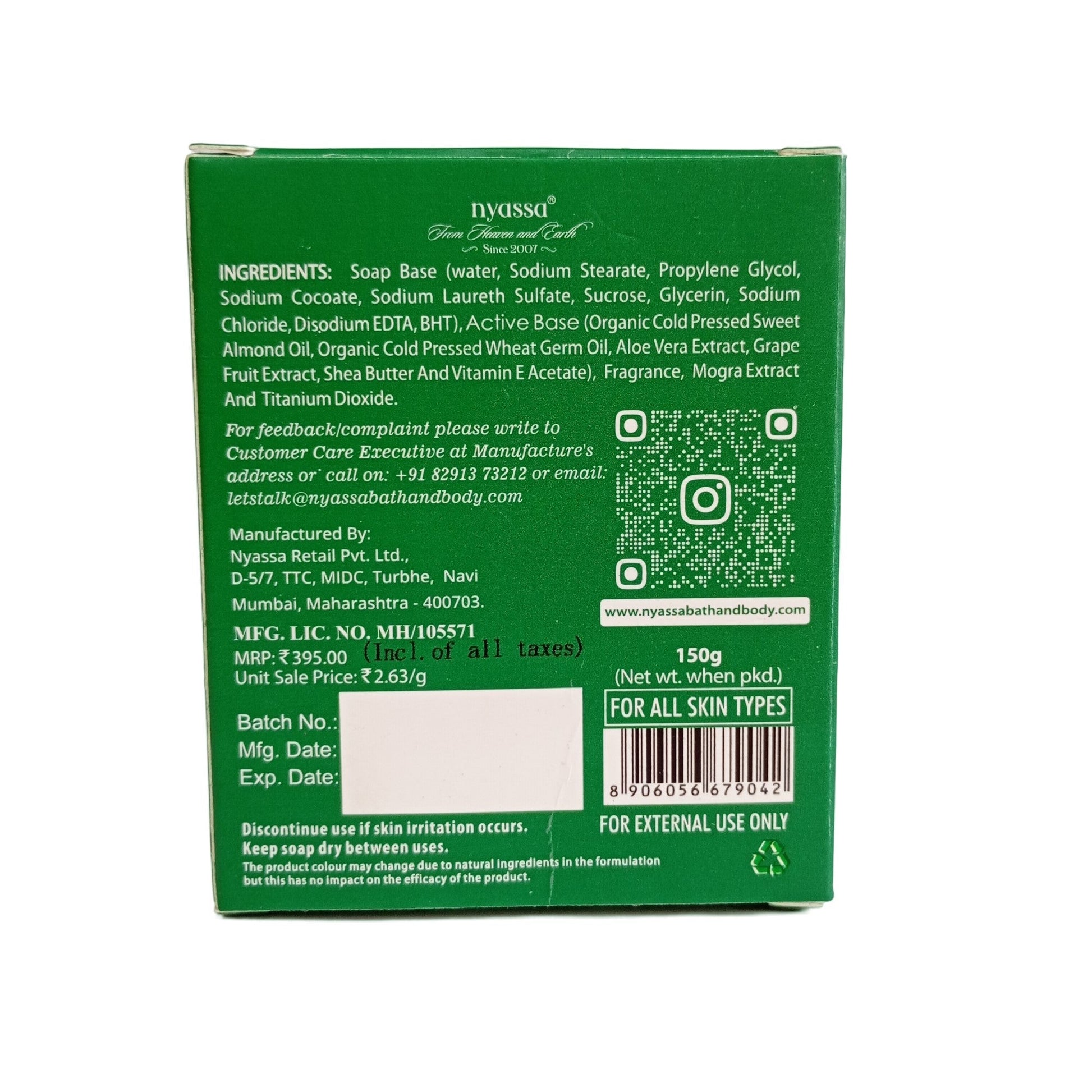 The back of a green soap box showing product details, ingredients, a QR code, and a barcode on a white background.