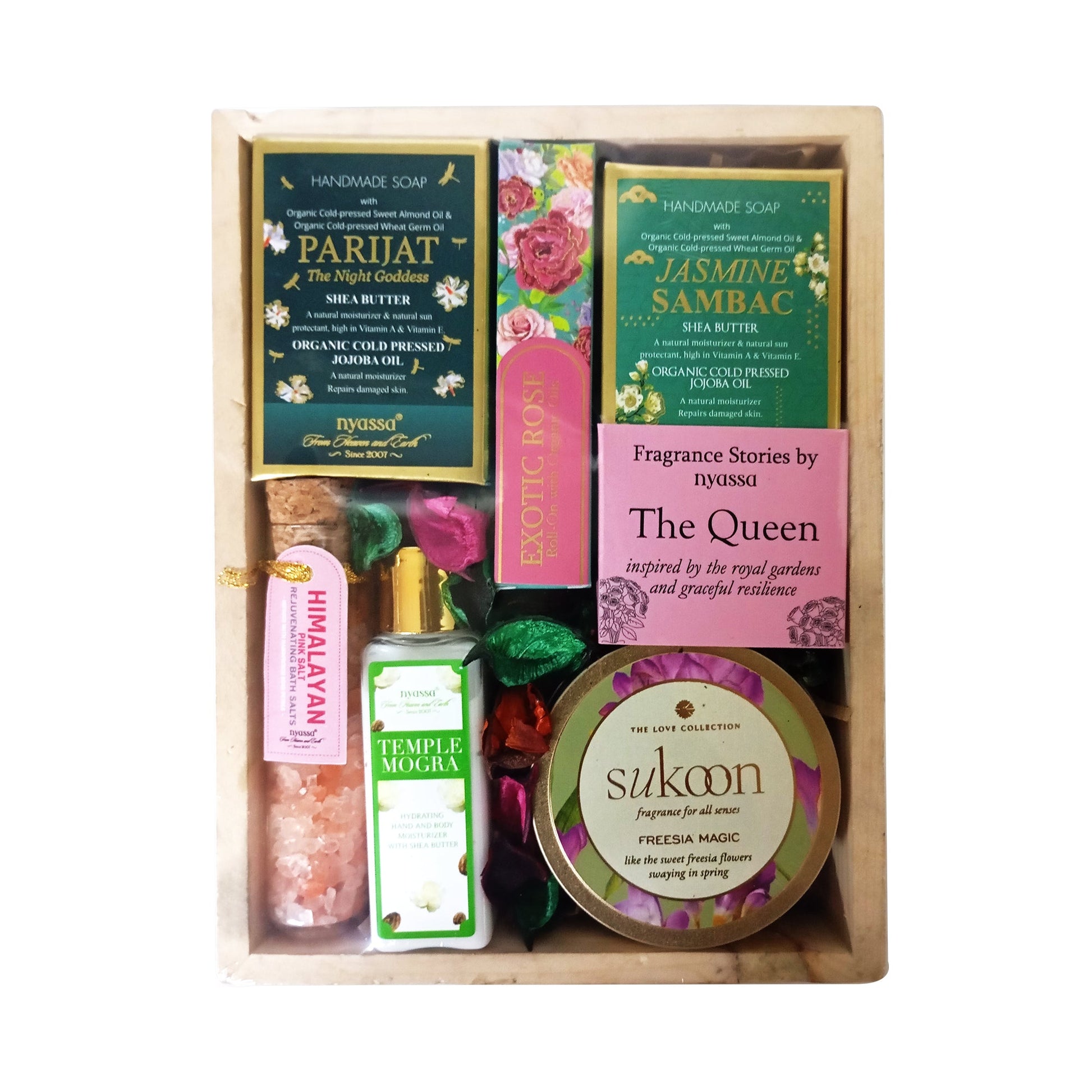 Gourmet gift set with items on a wooden board
